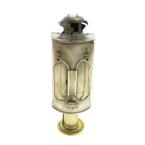 1181 - A 19thC lantern / hand lamp, the interior with spring-loaded candle, approx 8