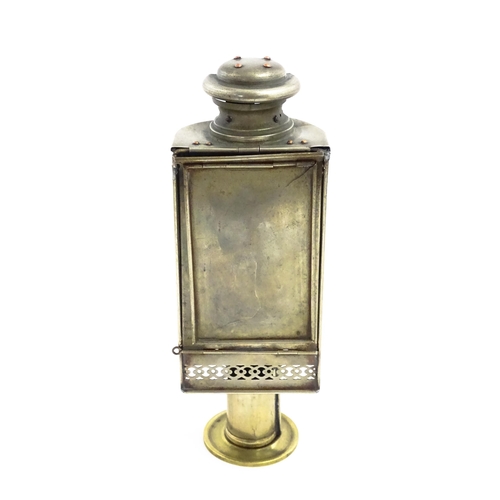 1181 - A 19thC lantern / hand lamp, the interior with spring-loaded candle, approx 8