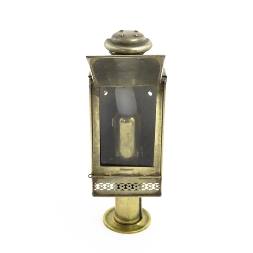 1181 - A 19thC lantern / hand lamp, the interior with spring-loaded candle, approx 8