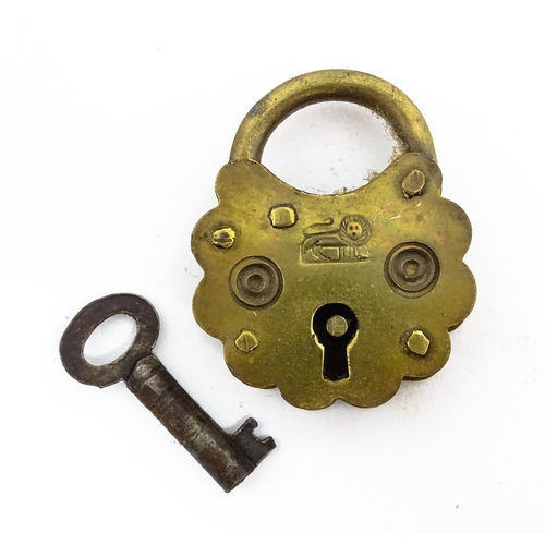 1184 - A quantity of assorted old keys. Together with a Victorian padlock, and another of shaped form with ... 