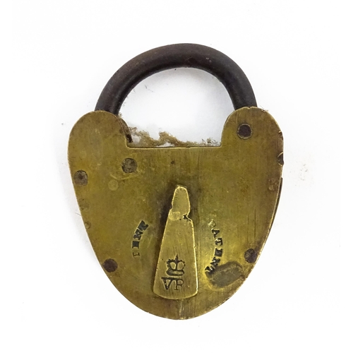 1184 - A quantity of assorted old keys. Together with a Victorian padlock, and another of shaped form with ... 