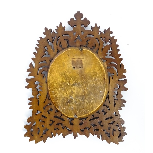 1188 - Three late 19th / early 20thC frames comprising a Black Forest style carved wooden frame with a hand... 