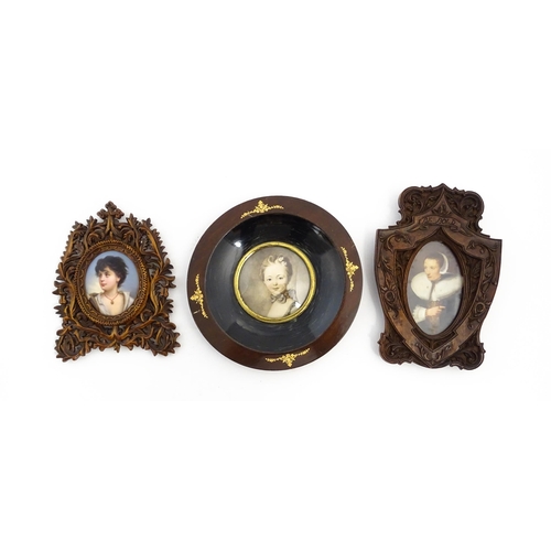 1188 - Three late 19th / early 20thC frames comprising a Black Forest style carved wooden frame with a hand... 