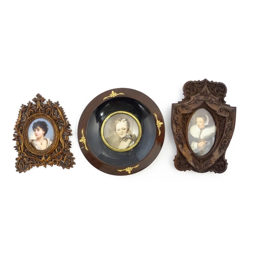 1188 - Three late 19th / early 20thC frames comprising a Black Forest style carved wooden frame with a hand... 