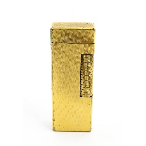 1197 - A c1970s Dunhill Rollagas lighter with chevron finish, cased with manual, approx 2 1/2