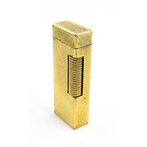 1197 - A c1970s Dunhill Rollagas lighter with chevron finish, cased with manual, approx 2 1/2