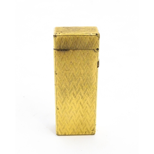 1197 - A c1970s Dunhill Rollagas lighter with chevron finish, cased with manual, approx 2 1/2