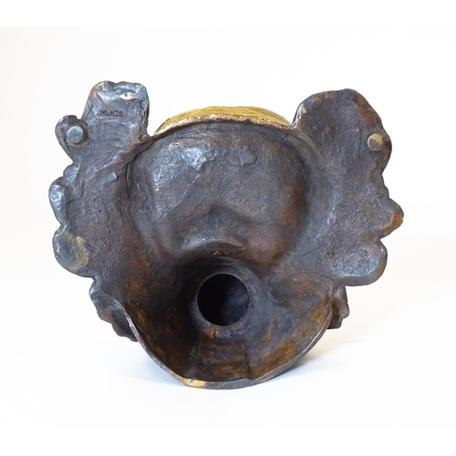 1199 - A late 20thC cast novelty inkwell formed as a Native American Indian with headdress. Approx. 4 1/4