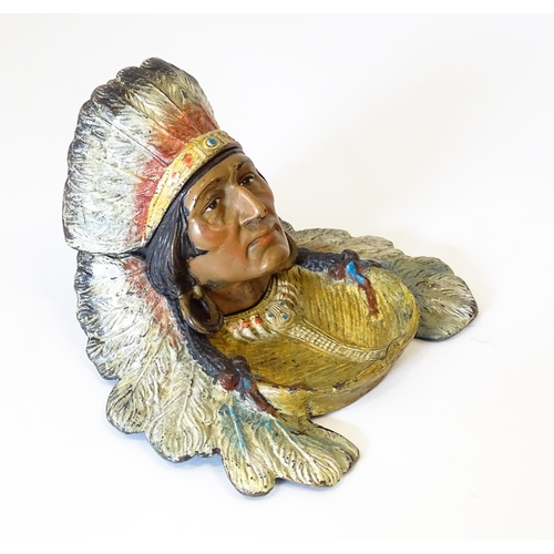 1199 - A late 20thC cast novelty inkwell formed as a Native American Indian with headdress. Approx. 4 1/4