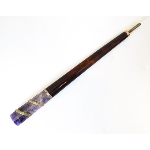 1202 - An early 20thC tortoiseshell parasol handle with blue john and rock crystal detail, with indistinctl... 