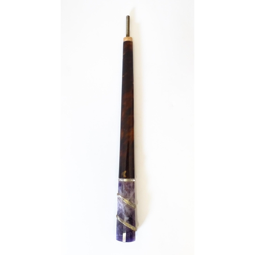 1202 - An early 20thC tortoiseshell parasol handle with blue john and rock crystal detail, with indistinctl... 