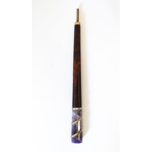 1202 - An early 20thC tortoiseshell parasol handle with blue john and rock crystal detail, with indistinctl... 