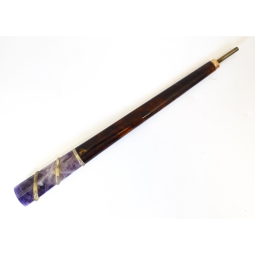 1202 - An early 20thC tortoiseshell parasol handle with blue john and rock crystal detail, with indistinctl... 