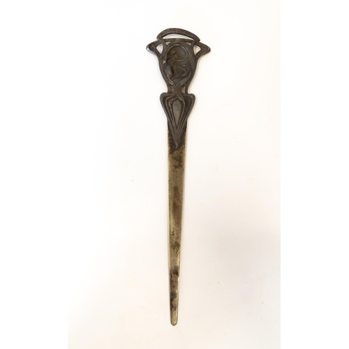 1203 - An Art Nouveau cast letter opener / paper knife with female head and tendril detail. In the WMF styl... 