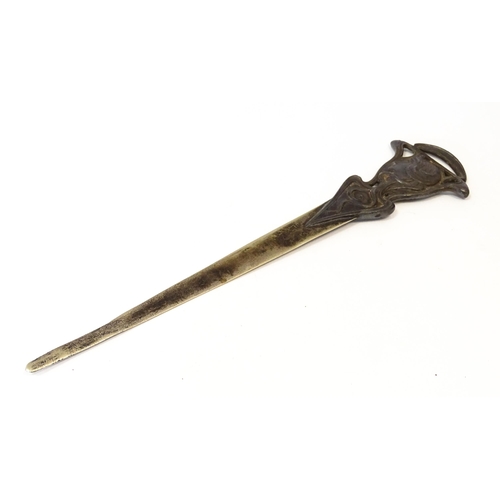 1203 - An Art Nouveau cast letter opener / paper knife with female head and tendril detail. In the WMF styl... 