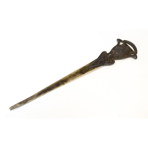 1203 - An Art Nouveau cast letter opener / paper knife with female head and tendril detail. In the WMF styl... 