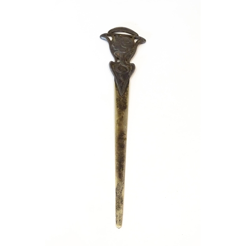 1203 - An Art Nouveau cast letter opener / paper knife with female head and tendril detail. In the WMF styl... 