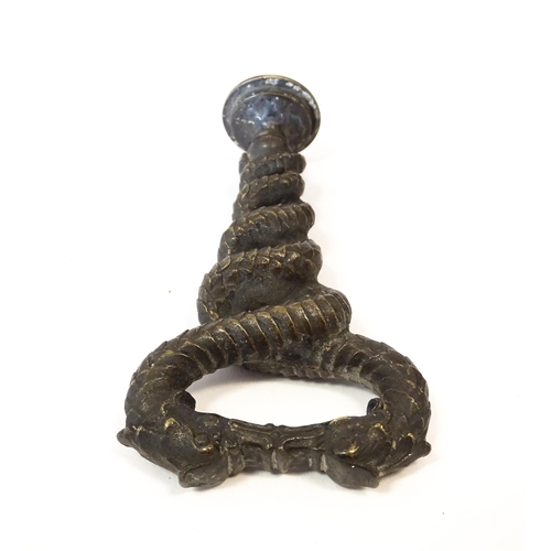 1204 - A 19thC cast desk / hand seal formed as two intertwined dragons / sea serpents, with monogram to sea... 