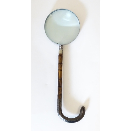 1208 - A silver mounted parasol handle with magnifying glass to one end. Approx. 13