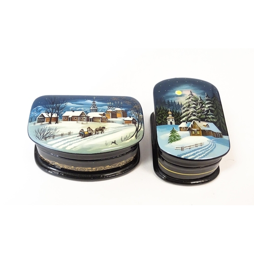 1212 - Two late 20thC Russian lacquered boxes decorated with winter scenes. Signed in Cyrillic under. Large... 