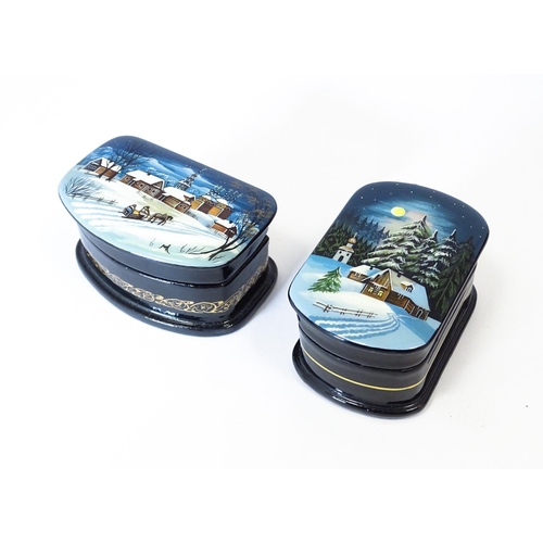 1212 - Two late 20thC Russian lacquered boxes decorated with winter scenes. Signed in Cyrillic under. Large... 