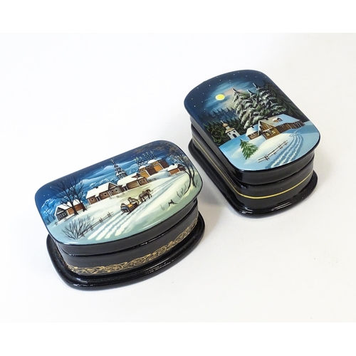 1212 - Two late 20thC Russian lacquered boxes decorated with winter scenes. Signed in Cyrillic under. Large... 