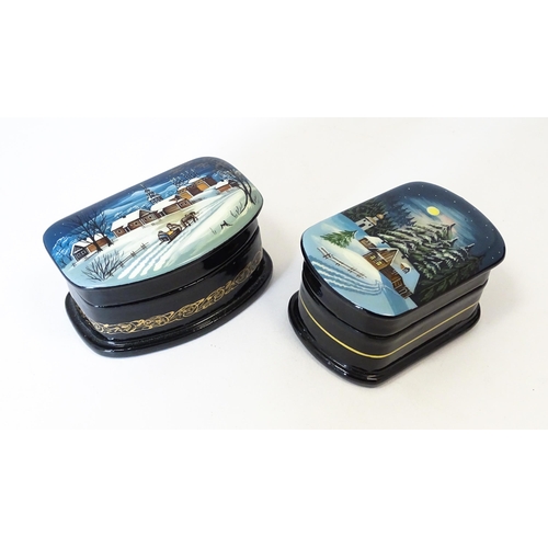 1212 - Two late 20thC Russian lacquered boxes decorated with winter scenes. Signed in Cyrillic under. Large... 