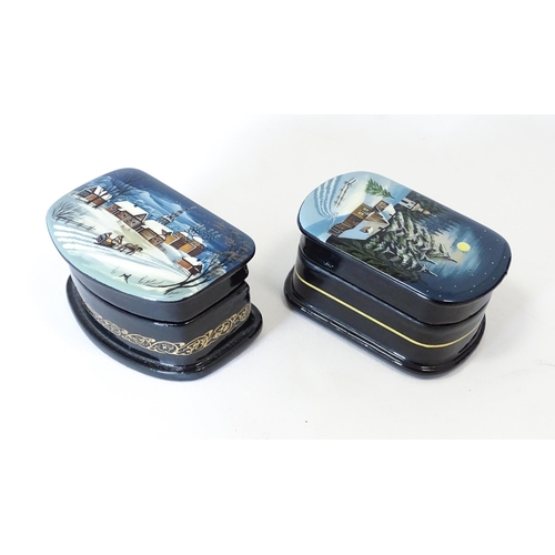 1212 - Two late 20thC Russian lacquered boxes decorated with winter scenes. Signed in Cyrillic under. Large... 