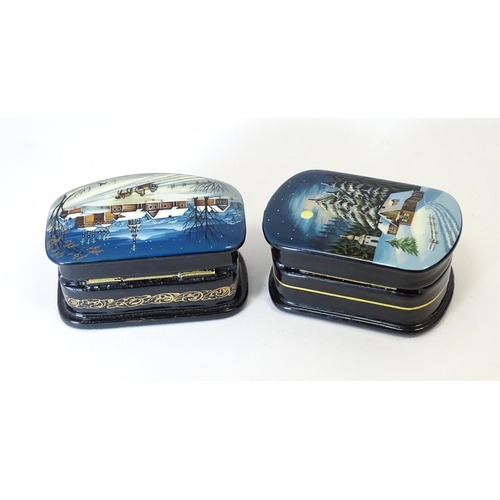 1212 - Two late 20thC Russian lacquered boxes decorated with winter scenes. Signed in Cyrillic under. Large... 