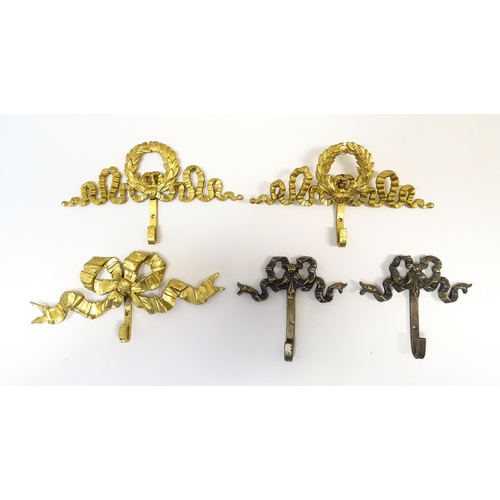 1217 - A quantity of assorted 20thC hangers / hooks with bow and chaplet detail, to include three gilt meta... 