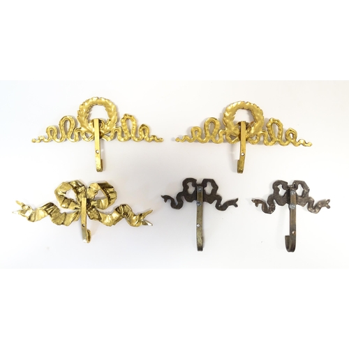 1217 - A quantity of assorted 20thC hangers / hooks with bow and chaplet detail, to include three gilt meta... 