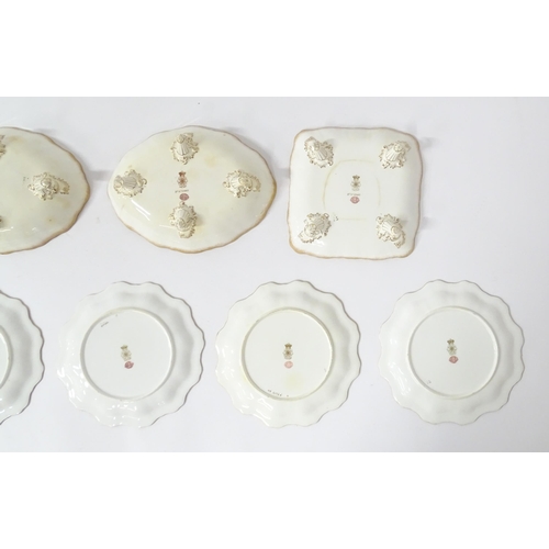 194 - A Doulton Burslem dessert service comprising four serving dishes and six scalloped edge plates, each... 