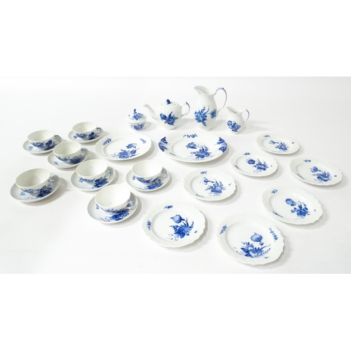 195 - A quantity of Royal Copenhagen tea wares decorated in the Blue Flowers pattern, to include teapot, w... 