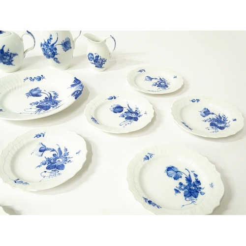 195 - A quantity of Royal Copenhagen tea wares decorated in the Blue Flowers pattern, to include teapot, w... 