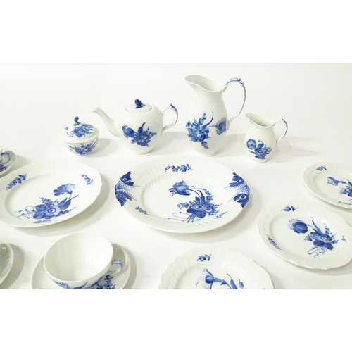 195 - A quantity of Royal Copenhagen tea wares decorated in the Blue Flowers pattern, to include teapot, w... 