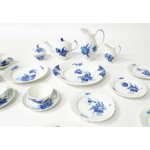 195 - A quantity of Royal Copenhagen tea wares decorated in the Blue Flowers pattern, to include teapot, w... 