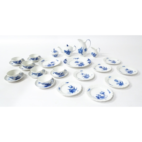 195 - A quantity of Royal Copenhagen tea wares decorated in the Blue Flowers pattern, to include teapot, w... 