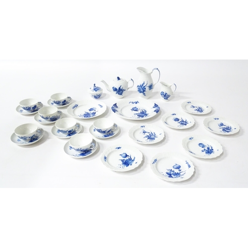 195 - A quantity of Royal Copenhagen tea wares decorated in the Blue Flowers pattern, to include teapot, w... 