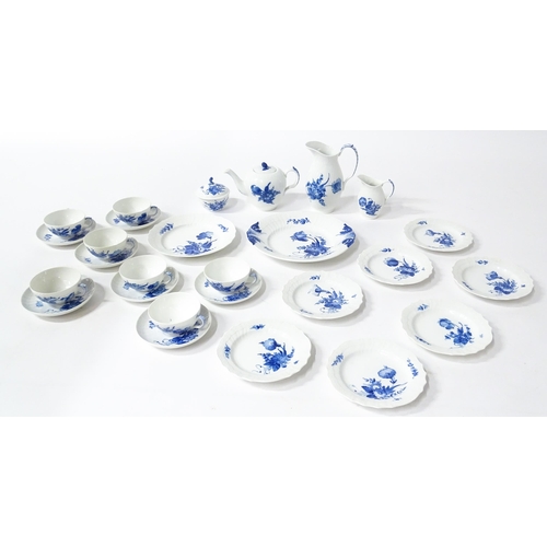 195 - A quantity of Royal Copenhagen tea wares decorated in the Blue Flowers pattern, to include teapot, w... 