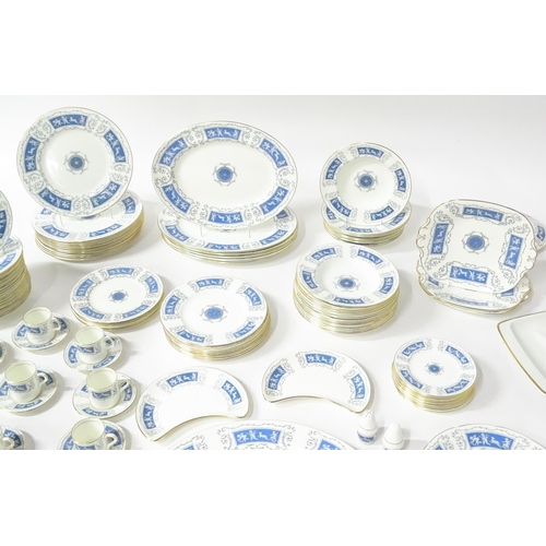 198 - A large quantity of Coalport dinner wares in the Revelry pattern to include dinner plates, dishes, c... 