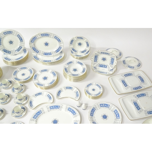 198 - A large quantity of Coalport dinner wares in the Revelry pattern to include dinner plates, dishes, c... 