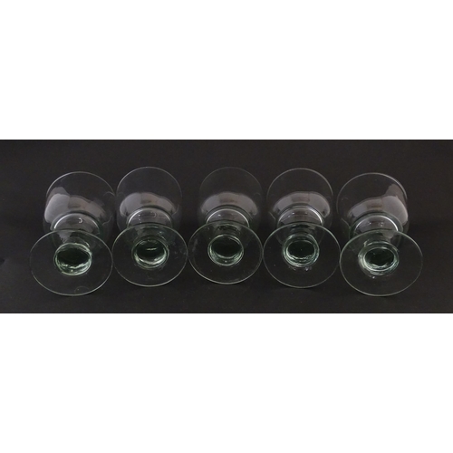 232 - A set of five pedestal drinking glasses. Approx. 5 1/2