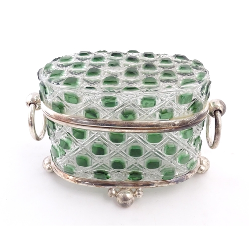 234 - A late 20thC biscuit box / hinged lidded box the green and clear cut glass body with silver plate mo... 