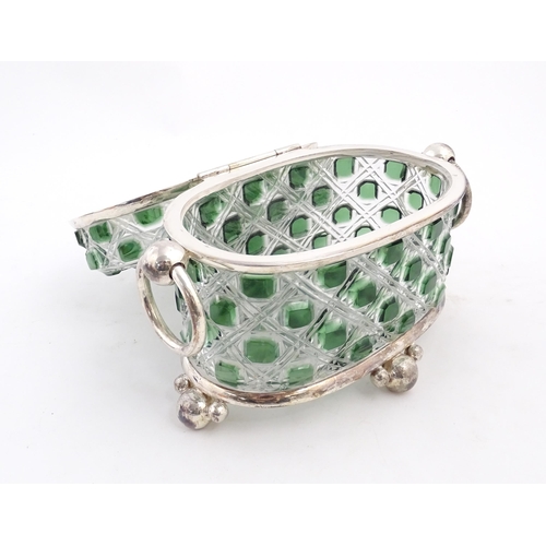 234 - A late 20thC biscuit box / hinged lidded box the green and clear cut glass body with silver plate mo... 