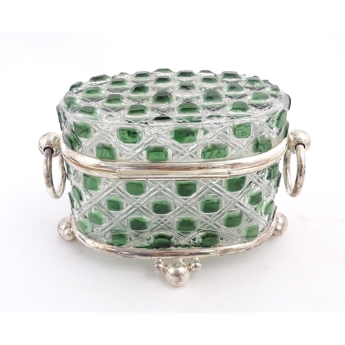 234 - A late 20thC biscuit box / hinged lidded box the green and clear cut glass body with silver plate mo... 