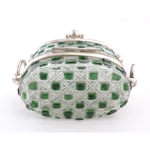 234 - A late 20thC biscuit box / hinged lidded box the green and clear cut glass body with silver plate mo... 