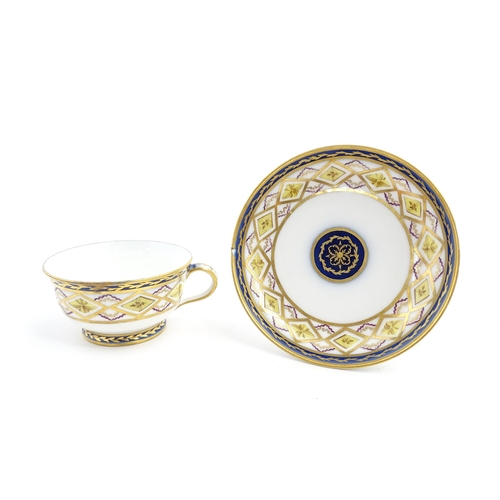 78 - A French 19thC Charles Philippe of Paris porcelain tea cup and saucer with banded decoration and gil... 