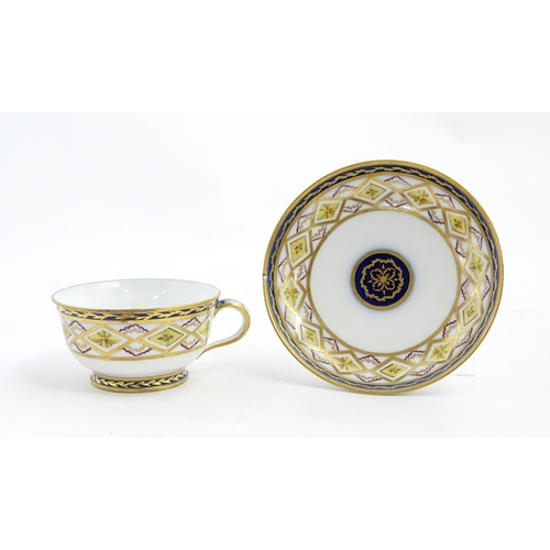 78 - A French 19thC Charles Philippe of Paris porcelain tea cup and saucer with banded decoration and gil... 