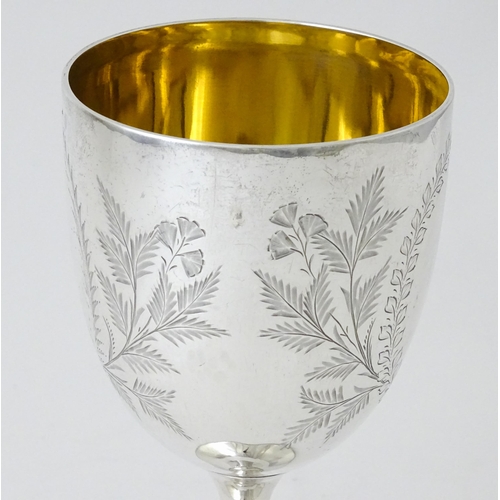 390 - A Victorian silver goblet with engraved foliate detail and gilded interior, hallmarked Sheffield 189... 