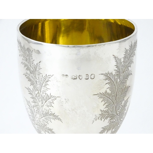 419 - A Victorian silver goblet with engraved fern detail and gilded interior, hallmarked London 1870, mak... 